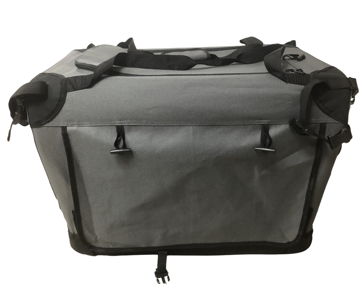 Three-quarter angle view of the Ruff N Tuff collapsible grey canvas dog crate, closed