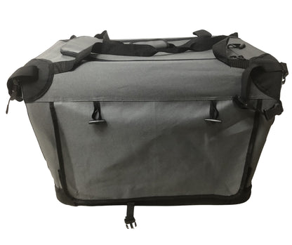 Three-quarter angle view of the Ruff N Tuff collapsible grey canvas dog crate, closed