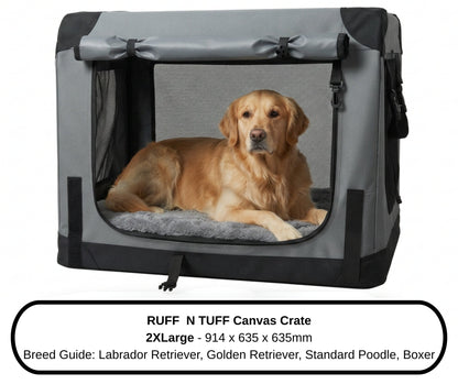 Golden Retriever resting in the 2XLarge Ruff N Tuff dog crate with a pet bed inside